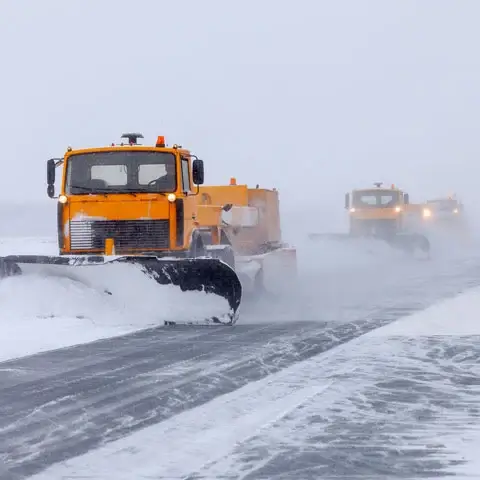 Snow sweepers in storm